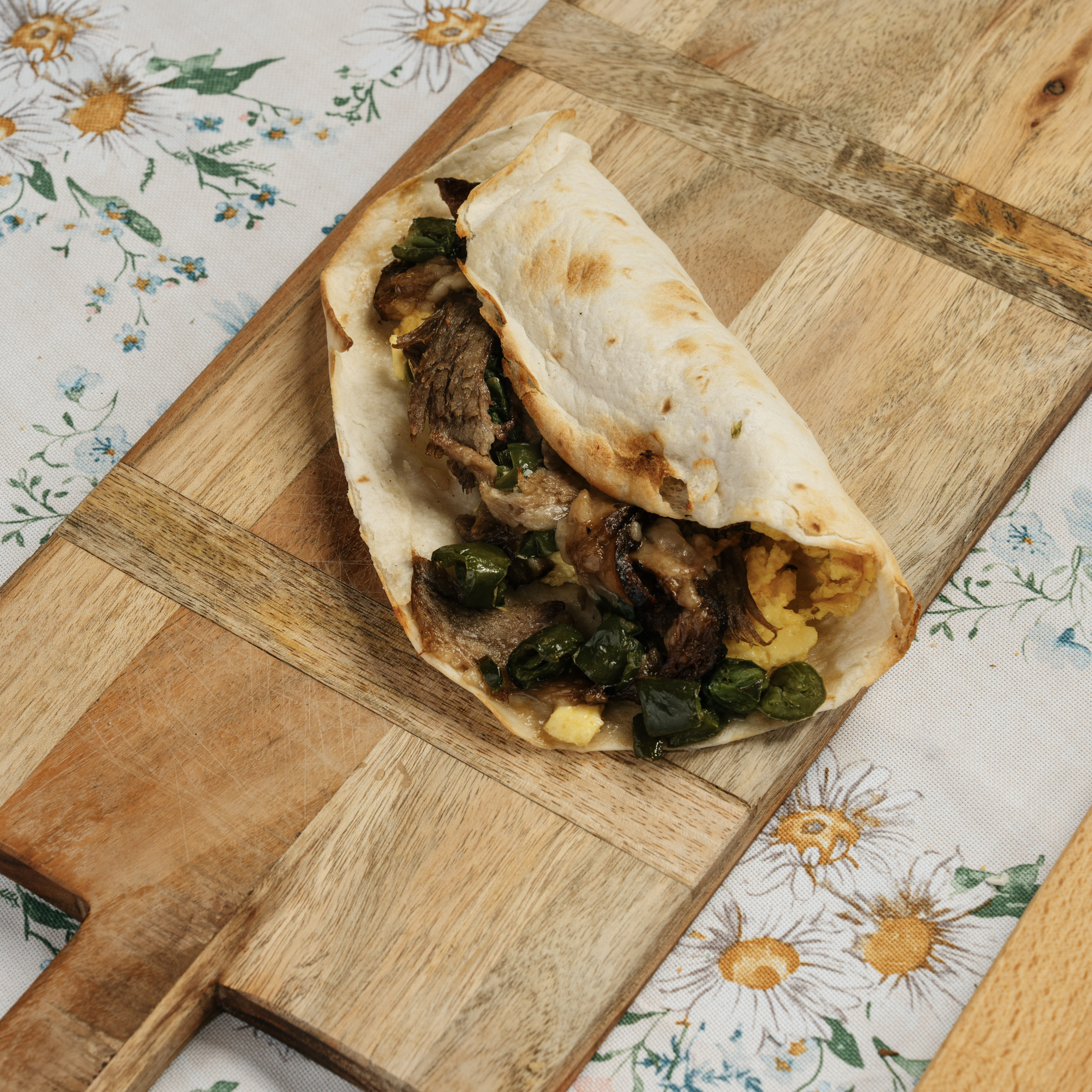 Professional food photography of Tex-Mex brisket tacos for Austin restaurant